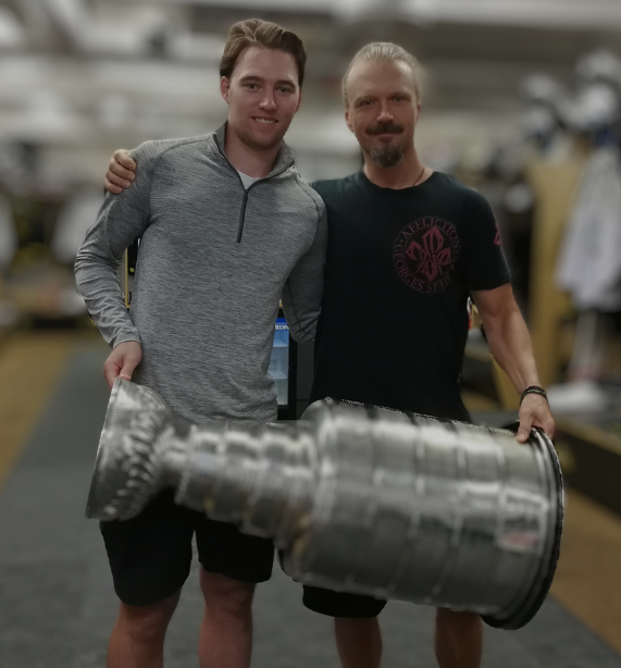 Proudly holding the Stanley Cup with Christian Djoos